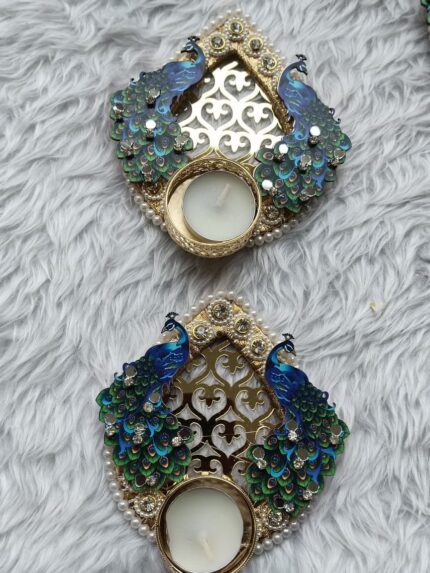 decorative peacock-themed tea light candles by aanchals creations